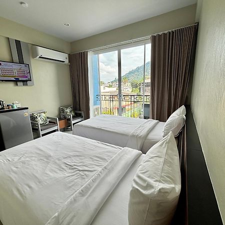 Siri Hotel Phuket Bagian luar foto